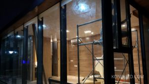 The "Moonbox" is being constructed into the night to meet the tight deadline set by the client.