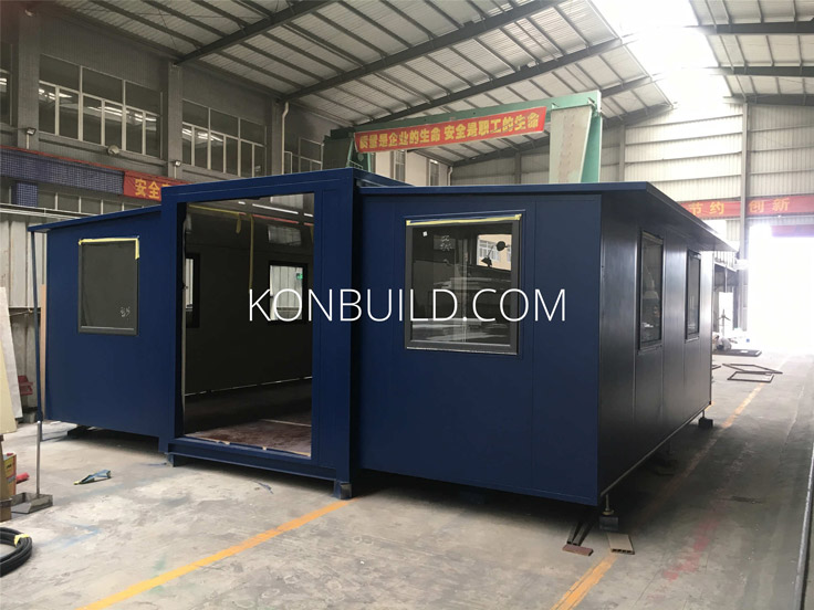 A factory manufactured shipping container home.