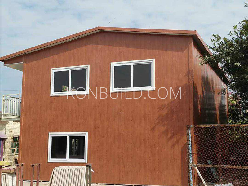 A large quickly built workers accommodation building.